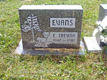 E. Trevor EVANS