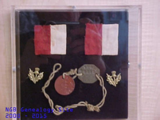 Pte Small's ID discs, flashes and insignia
